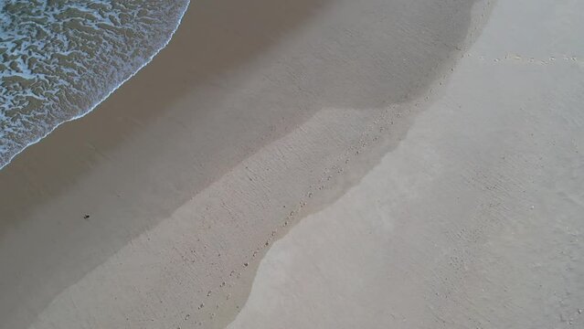 Raised the drone camera from the beach of Vieux Boucau the gravel pits towards the great tower of Messanges