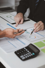 Executives and managers are meeting in a conference room, on the table there are some documents about the company's finances, managers are discussing financial information with the management.