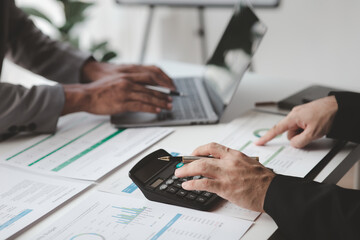 Executives and managers are meeting in a conference room, on the table there are some documents about the company's finances, managers are discussing financial information with the management.