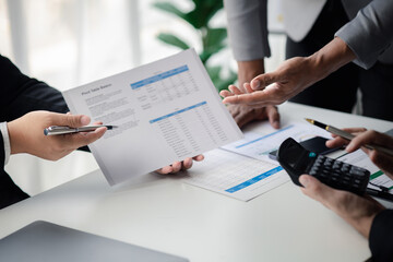Meeting room atmosphere, business people meeting together on finance topics, they are working together to plan and solve corporate finance issues. Concept of business administration and finance.