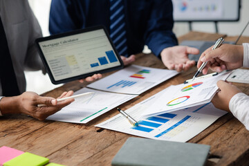 Group business people are having a meeting and planning their business together in the conference room, leaders of startup companies share their opinions and discuss how to run a successful business.