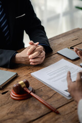 Client was listening to a lawyer advising on an embezzlement case, explaining the details of the proceeding and gathering evidence to file a lawsuit against the defendant. The concept of litigation.