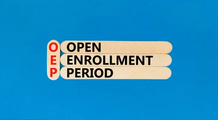 Deurstickers OEP symbol. Concept words OEP Open enrollment period on beautiful wooden sticks. Beautiful blue table blue background. Medical and OEP Open enrollment period concept. Copy space. © Dzmitry