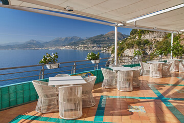 Dinner tables near sea, Beautiful details of Amalfitana at summer