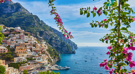 Panoramic view of Positano with comfortable beaches and blue sea on Amalfi Coast in Campania, Italy.
