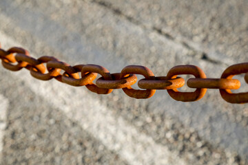 A thick rusty chain is a barrier