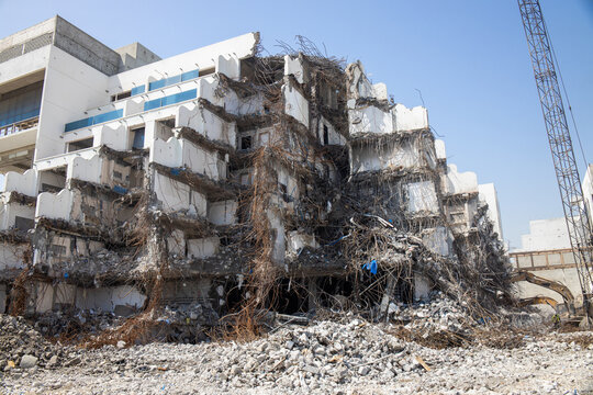 Demolition of old building with debris and steel reinforcement. earthquake and natural disasters 