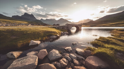 A river runs through a valley with mountains in the background