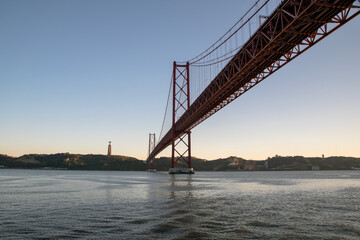 View of Ponte 25 de Abril Bridge on the Tagus River at sunset, Lisbon, Portugal