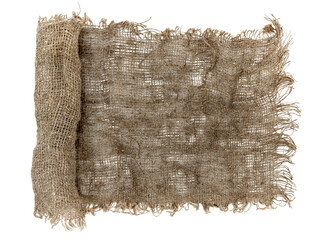 Burlap texture. A piece of torn burlap on a white background. Canvas. Packing material