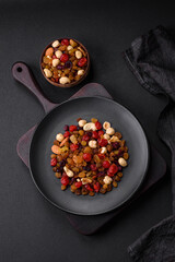 Mix of roasted cashews, hazelnuts and walnuts with dried cranberries and raisins