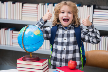 Excited pupil. Little student school child. Portrait of nerd student with school supplies.