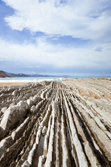 Itzurun.'s beach. Cloudy day in Zumaia, Guipuzkoa, Spain. Zumaia's flysch. 