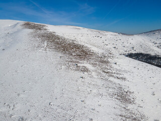 Aerial winter view of Balkan Mountains around Beklemeto pass, Bulgaria