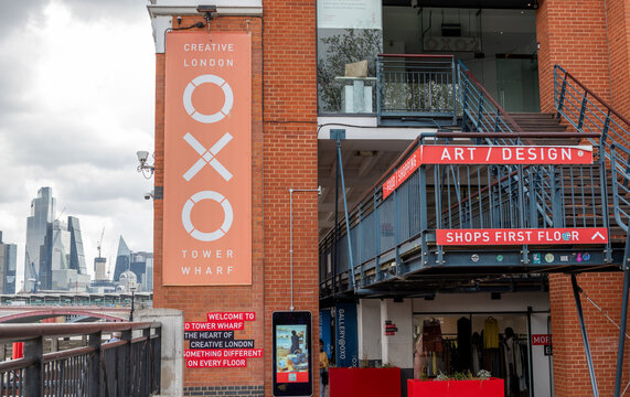 London. UK- 05.17.2023. The street level name sign of the Oxo Tower Building on the south bank of the River Thames.