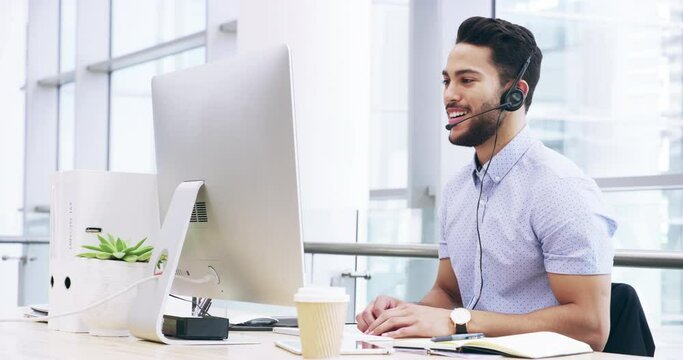 Call center, man and talking at computer in office for advice, customer service or technical support. Male telemarketing agent, desktop and consulting of telecom questions, communication or help desk