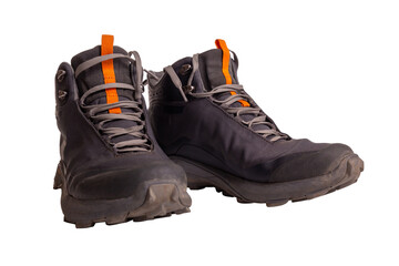 Pair of gray hiking boots,isolate on a white background. Hiking boots with a powerful tread and membrane material.
