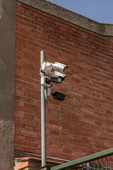 Outdoor surveillance cameras attached