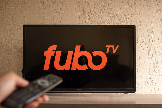 Brazil, Rio de Janeiro - May 19, 2023:  In this photo illustration the  FuboTV logo in background on tv