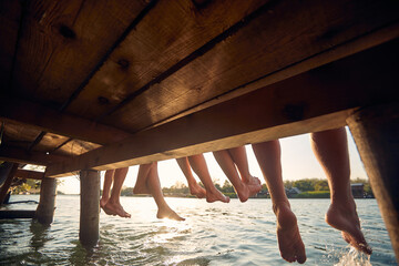 Group of friends enjoying the summer break on the river