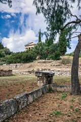 Fototapeta na wymiar Remote view of the temple of Hephaestus in Ancient Agora, Athens, Greece