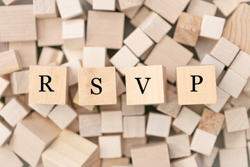 RSVP (please reply) concept. Abstract geometric wooden dice.  RSVP icon. 