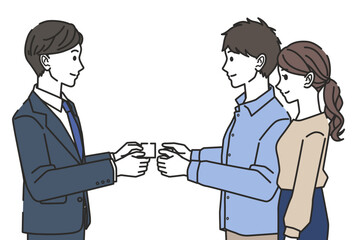 名刺を受け取る夫婦
