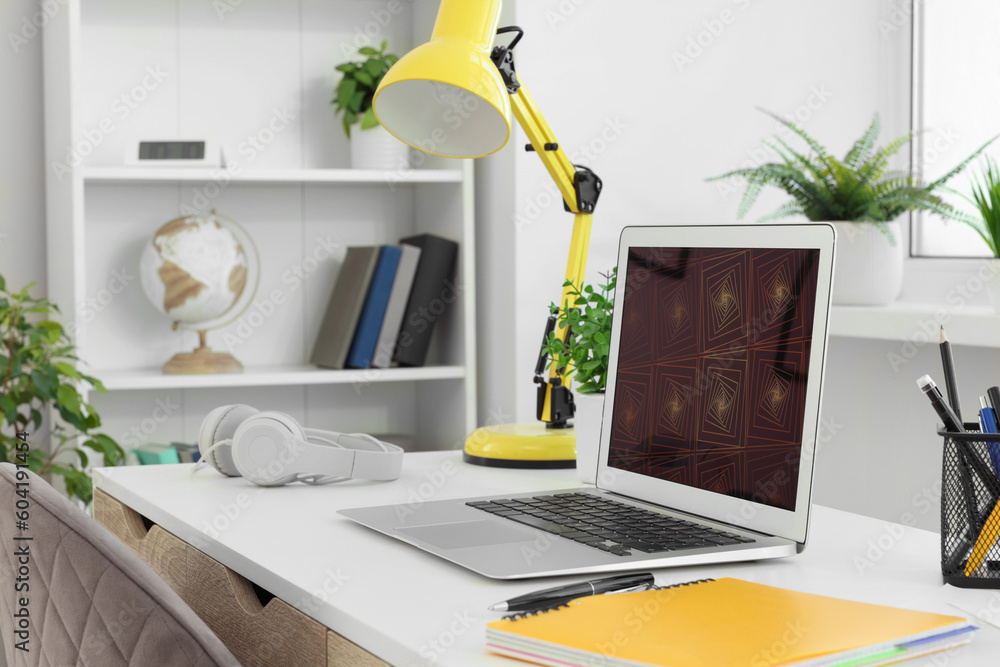 Sticker Cozy workspace with laptop on white wooden desk at home