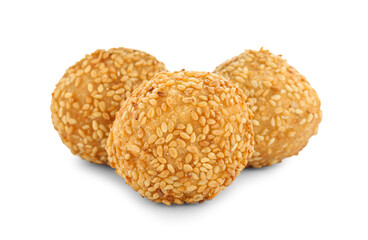 Many delicious sesame balls on white background