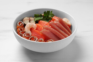 Delicious mackerel, shrimps, salmon and tuna served with parsley on white marble table, closeup. Tasty sashimi dish