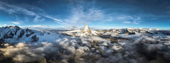 Aerial view of Matterhorn mountain peak in a sea of clouds at dawn, Zermatt, canton of Valais, Switzerland