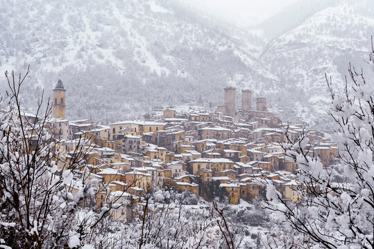 View of the village and the castle of Pacentro under heavy snowfall, Maiella National Park, L'Aquila province, Abruzzo, Italy