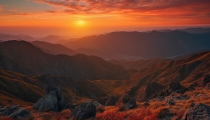 Naklejka premium Majestic mountain range, tranquil sunset, beauty in nature generated by AI