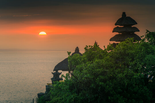 View of Tanah Lot, traditional Balinese temple at sunset, Beraban, Kediri, Tabanan Regency, Bali