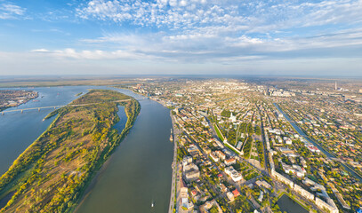 Astrakhan, Russia. Panorama of the city from the air in summer. The Volga River and Gorodstoy Island. Aerial view