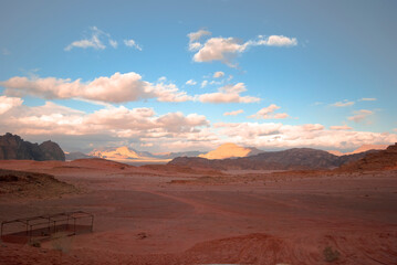 Fototapeta premium sunset in the desert.Panoramic view of the desert mountains with the sky.Jordan Travel.Wadi Rum.