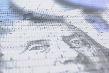 Blue pills over dollar. Concept of cost of health and drug abuse.