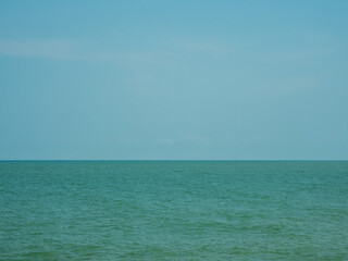Obraz premium Panorama front view landscape Blue sea and sky blue background morning day look calm summer Nature tropical sea Beautiful ocen water travel Bangsaen Beach East thailand Chonburi Exotic horizon.