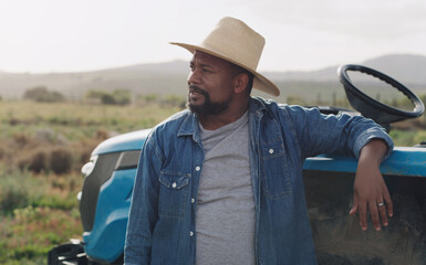 Farming, thinking and a black man with a tractor on a farm for agriculture growth and...