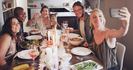 Diversity, dining table and friends taking a selfie at dinner, party or event at a modern home. Happy, smile and young people taking a picture together while eating a lunch meal with wine in a house.