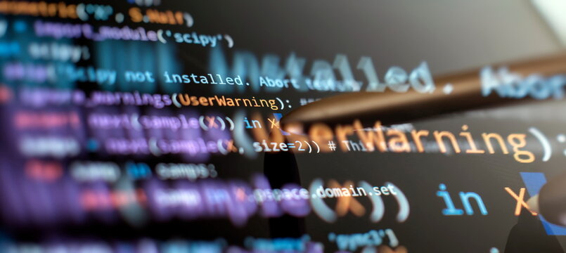 Programmer working on computer code, developer of software applications and IT