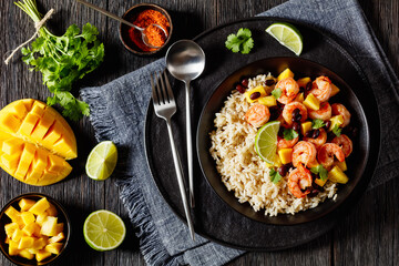 shrimps with beans, mango, brown rice in bowl
