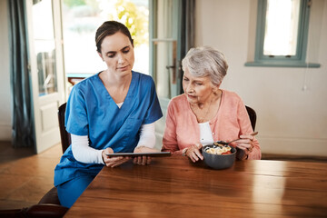 Elderly woman, nurse and breakfast tablet for reading, video or news online for focus together in...