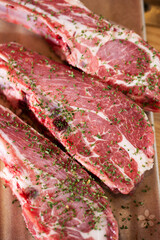 Seasoned lamb ribs on a plate