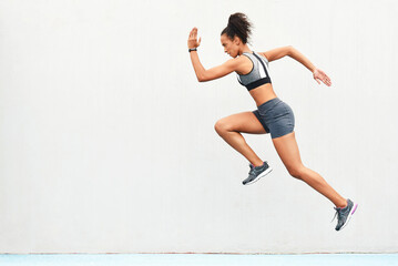 Woman, fitness and running on mockup for sports in cardio training, workout or healthy exercise....