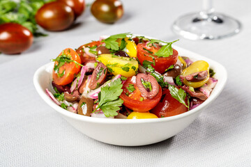 salad with tomatoes and hrebs