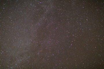 Night and cloudless sky with lots of bright stars.