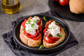 bruschetta with tomatoes and strachatella cheese