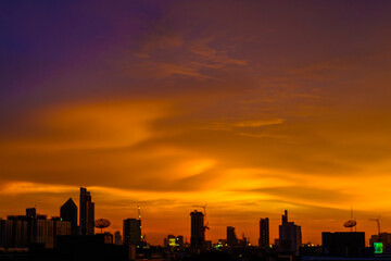 Fototapeta na wymiar City building colorful sunset sky silhouette scene