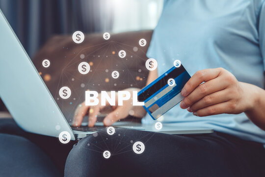 BNPL-Buy Now Pay Later shopping online icon , Online banking woman using Laptop ,smartphone holding credit card online shopping concept.
